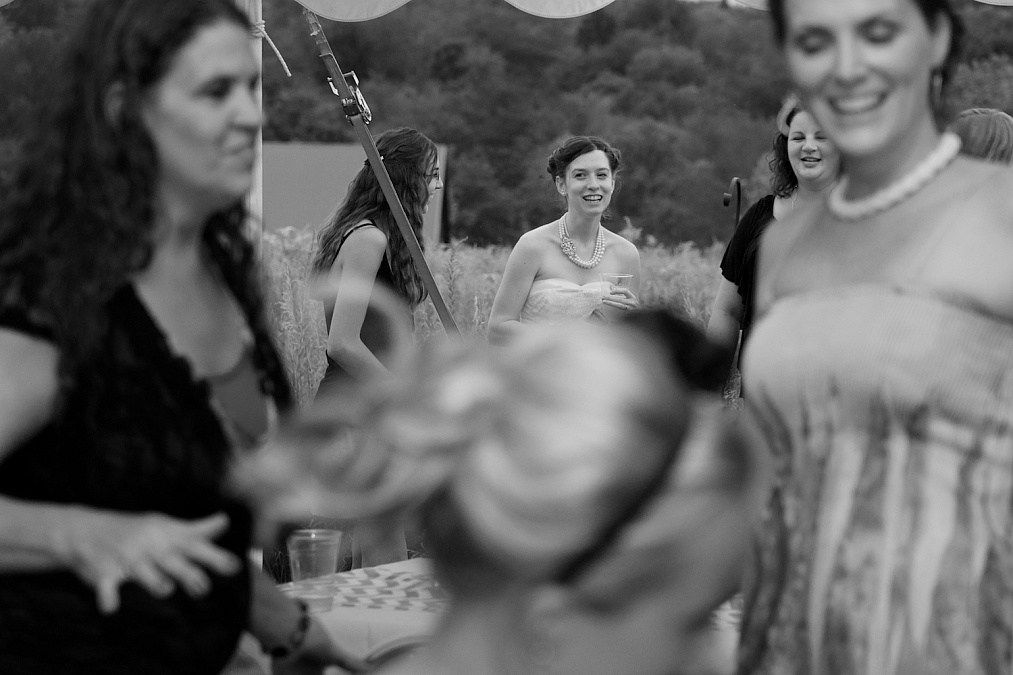 Candid, documentary images from the reception at the Gardens at Gazebo on the Green in Iowa City, Iowa.